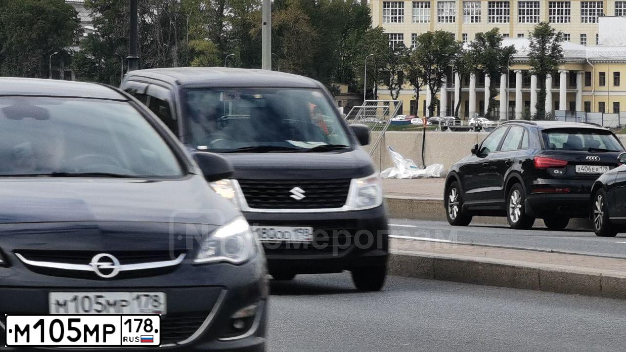 Фото автомобиля OPEL ASTRA, 2013 — госномер М105МР178. Цвет: ЧЕРНЫЙ МЕТАЛЛИК