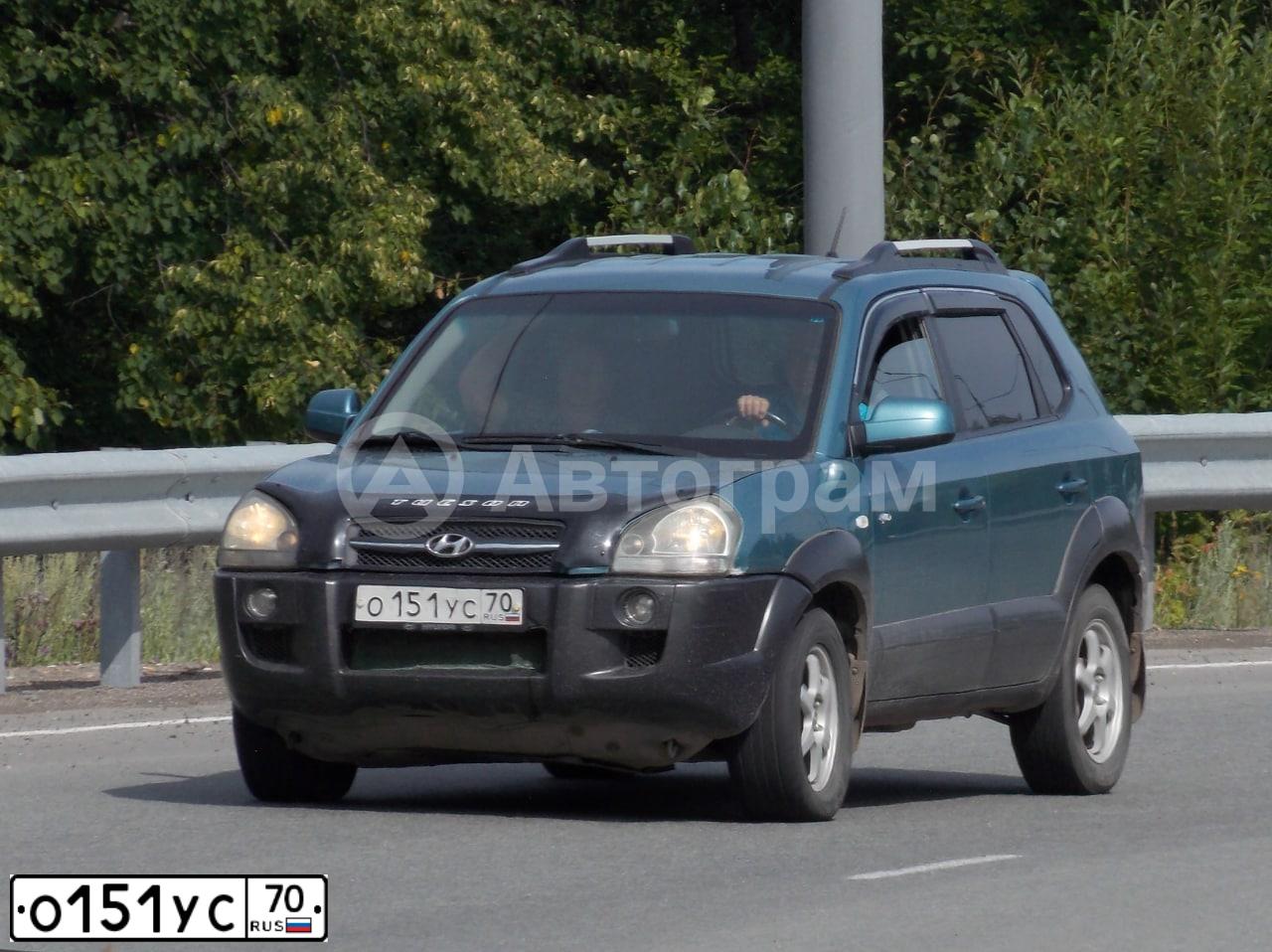 Фото автомобиля HYUNDAI TUCSON, 2007 — госномер О151УС70. Цвет: ТЕМНО-ГОЛУБОЙ