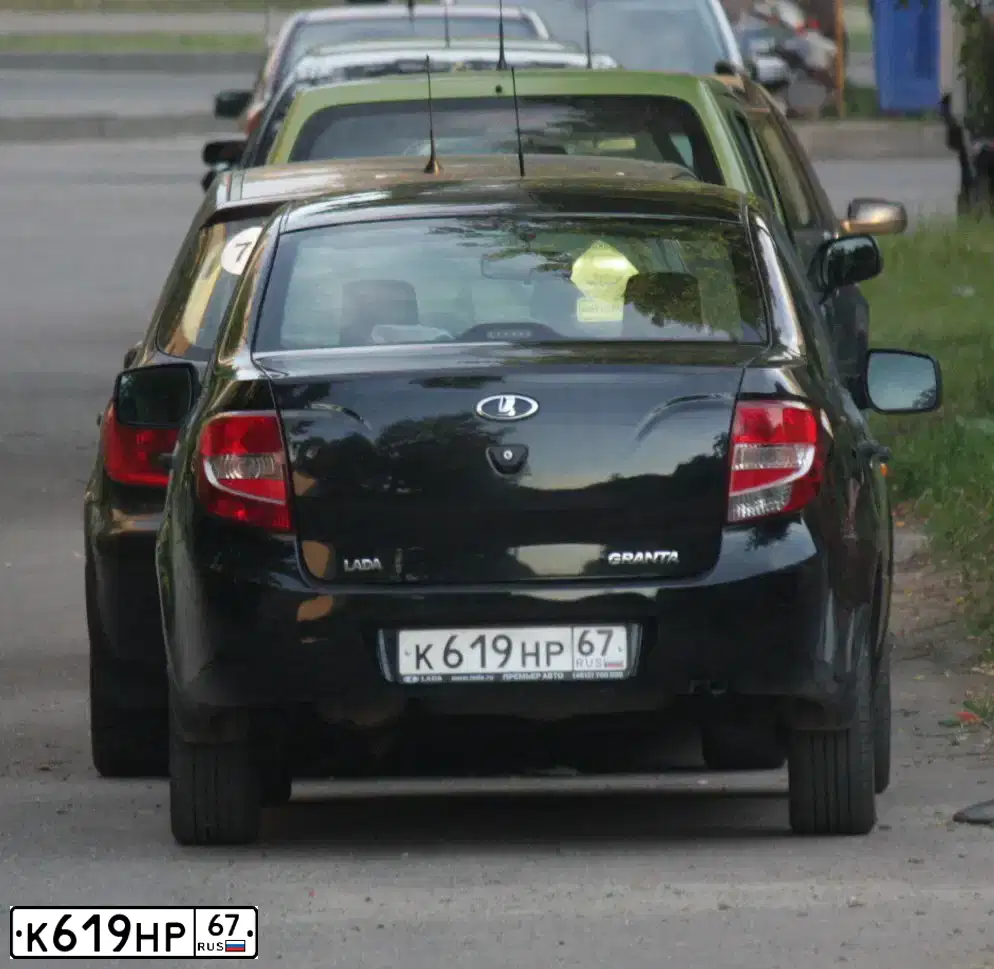 Фото автомобиля LADA 2190 GRANTA, 2014 — госномер К619НР67. Цвет: Сине-Черный