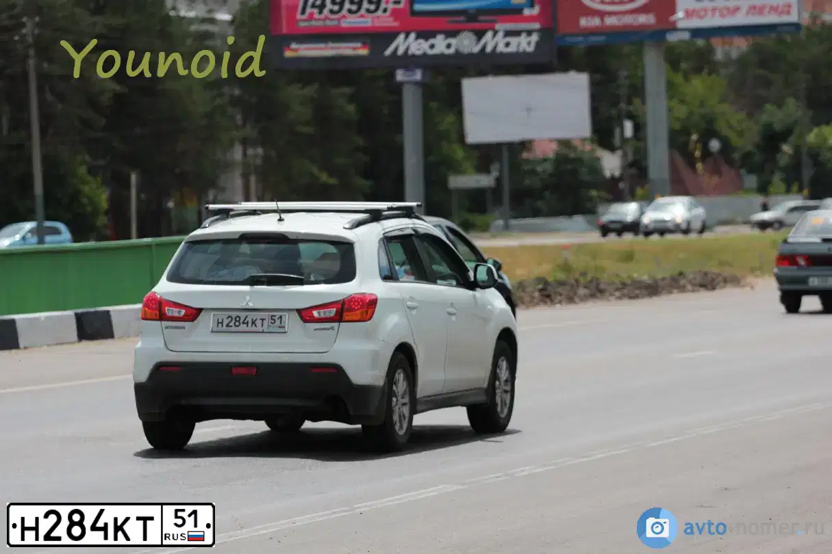 Фото автомобиля MITSUBISHI ASX, 2010 — госномер Н028ММ51. Цвет: БЕЛЫЙ