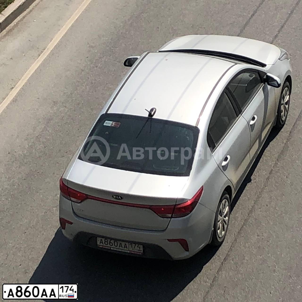 Фото автомобиля KIA RIO, 2017 — госномер А860АА174. Цвет: Серебристый