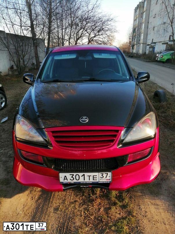 Фото автомобиля SSANGYONG KYRON, 2012 — госномер А301ТЕ37. Цвет: ЧЕРНЫЙ