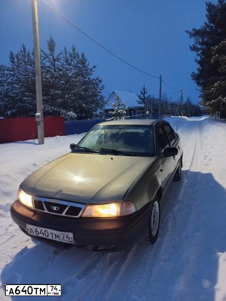 Фото автомобиля DAEWOO NEXIA, 2005 — госномер А640ТМ74. Цвет: ПЕСОЧНО-БЕЖЕВЫЙ