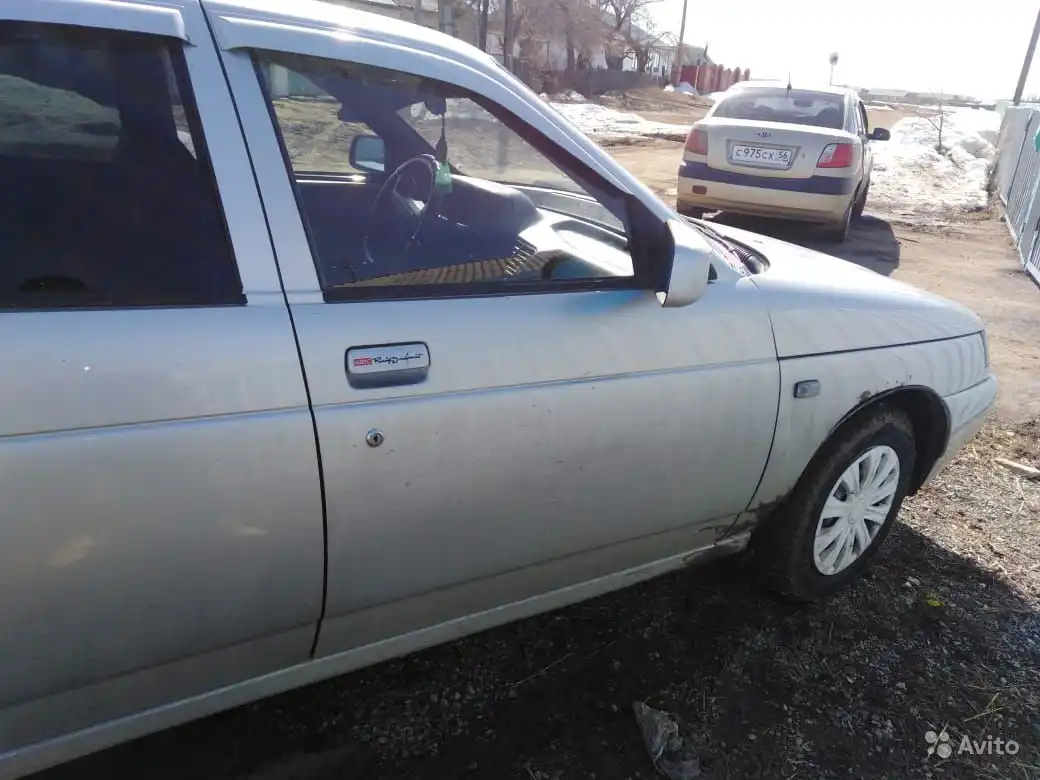 Фото автомобиля KIA RIO, 2009 — госномер С975СХ56. Цвет: БЕЖЕВЫЙ