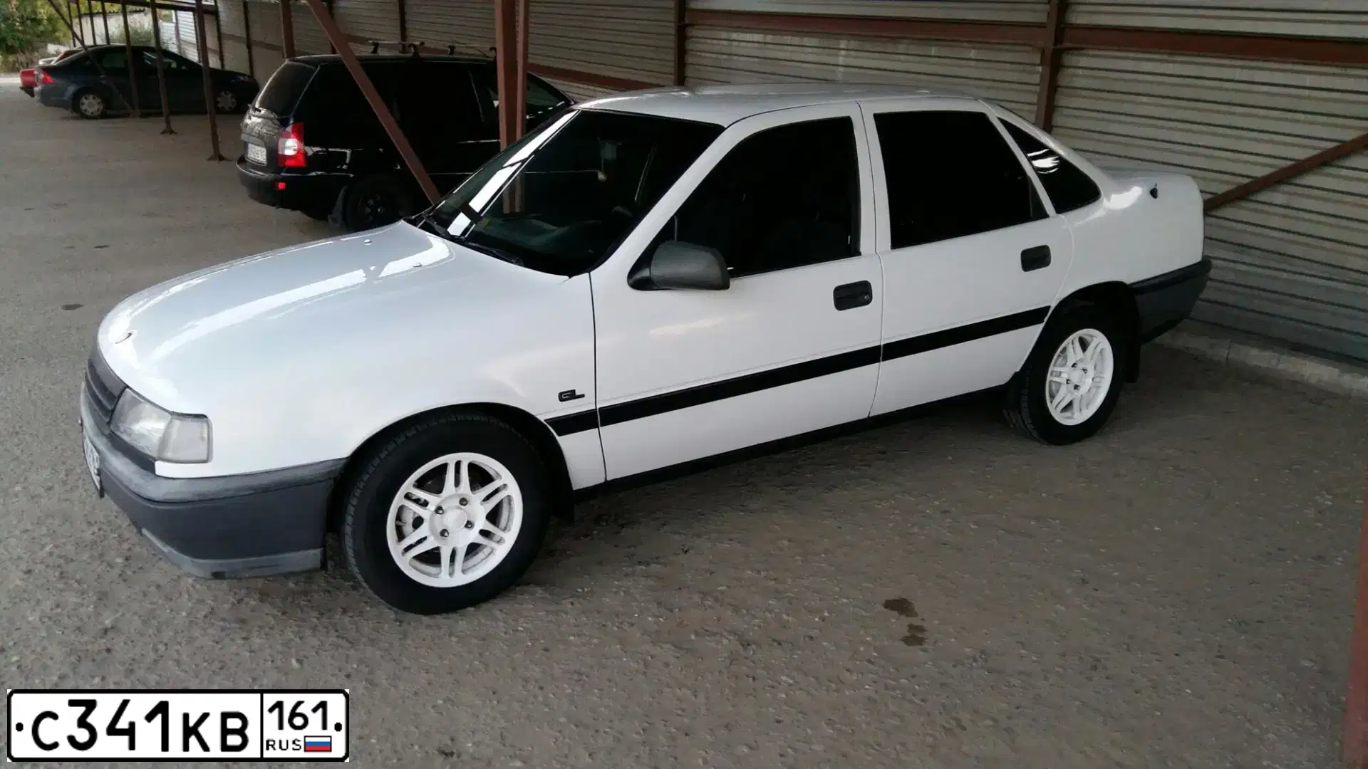 Фото автомобиля OPEL VECTRA, 1992 — госномер С341КВ161. Цвет: Белый
