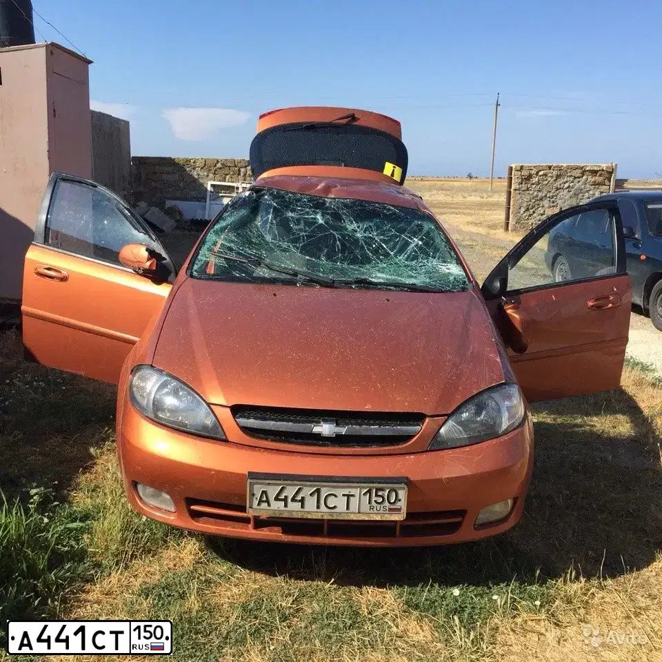 Фото автомобиля CHEVROLET LACETTI, 2008 — госномер А441СТ150. Цвет: ОРАНЖЕВЫЙ