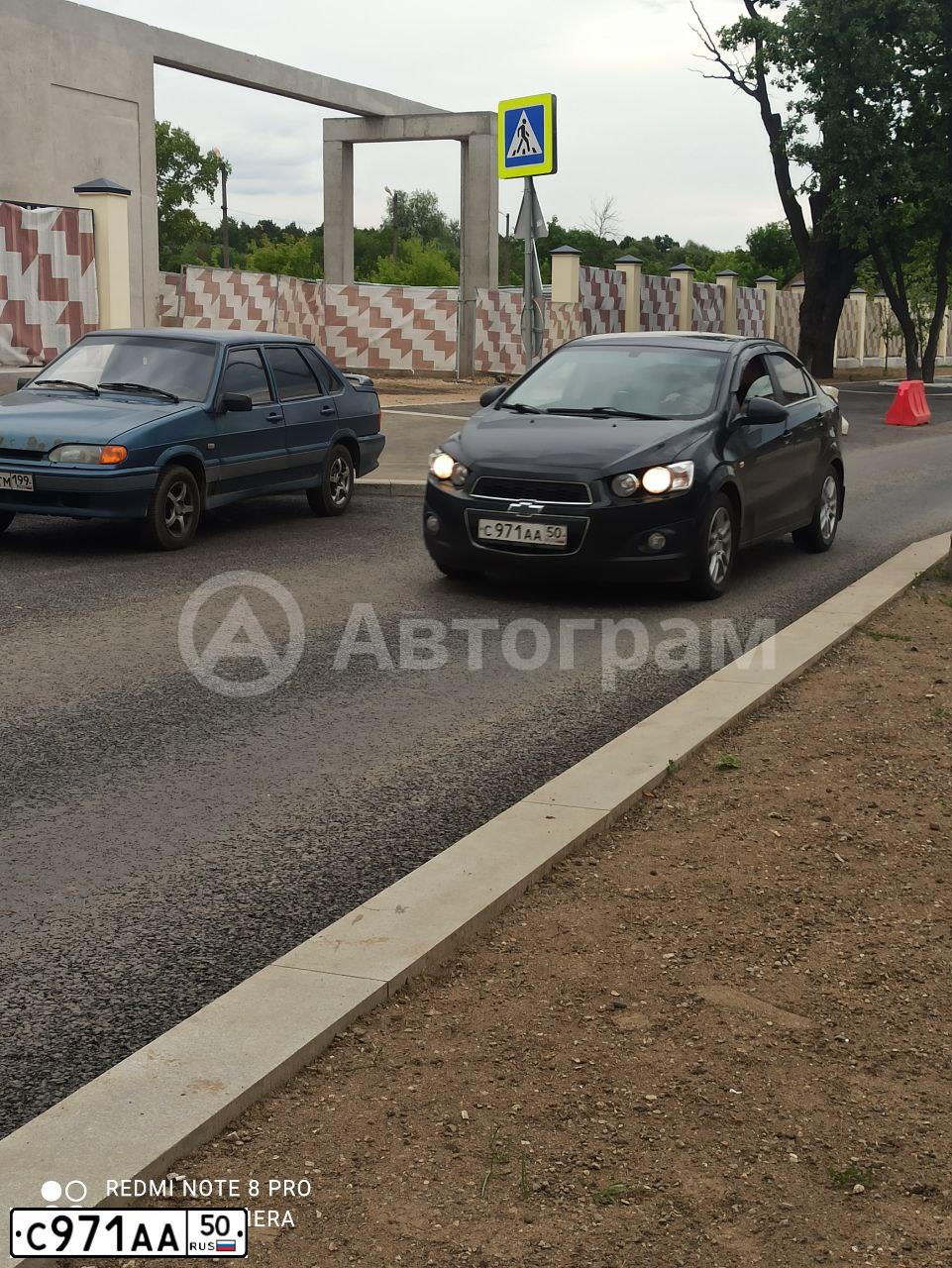 Фото автомобиля CHEVROLET AVEO, 2013 — госномер С971АА50. Цвет: ЧЕРНЫЙ