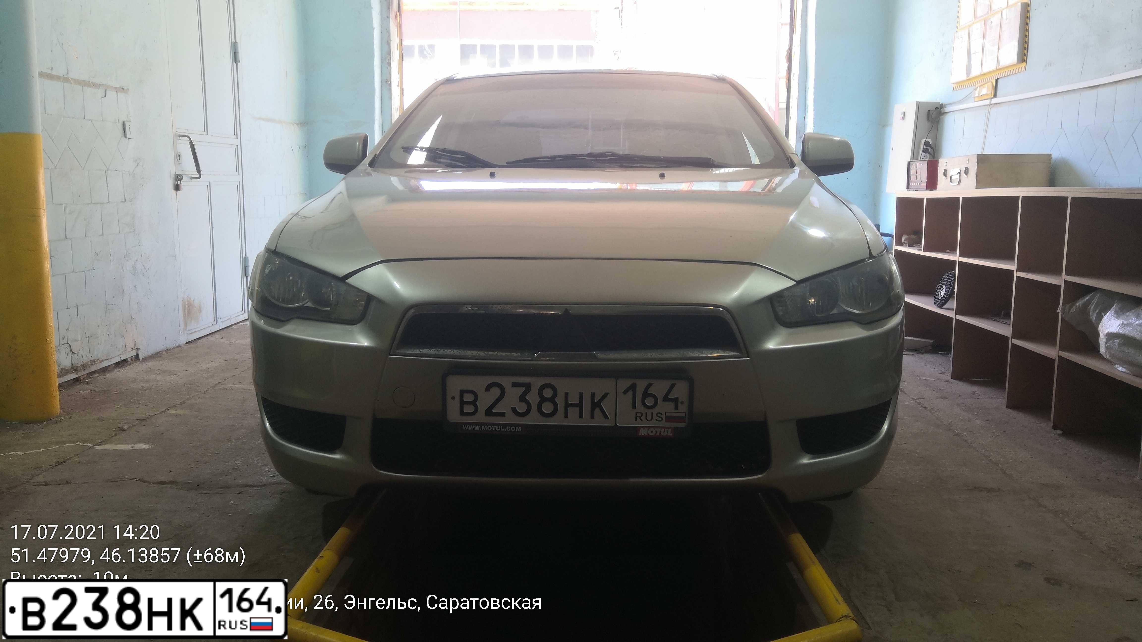 Фото автомобиля MITSUBISHI LANCER, 2007 — госномер В238НК164. Цвет: БЕЖЕВЫЙ