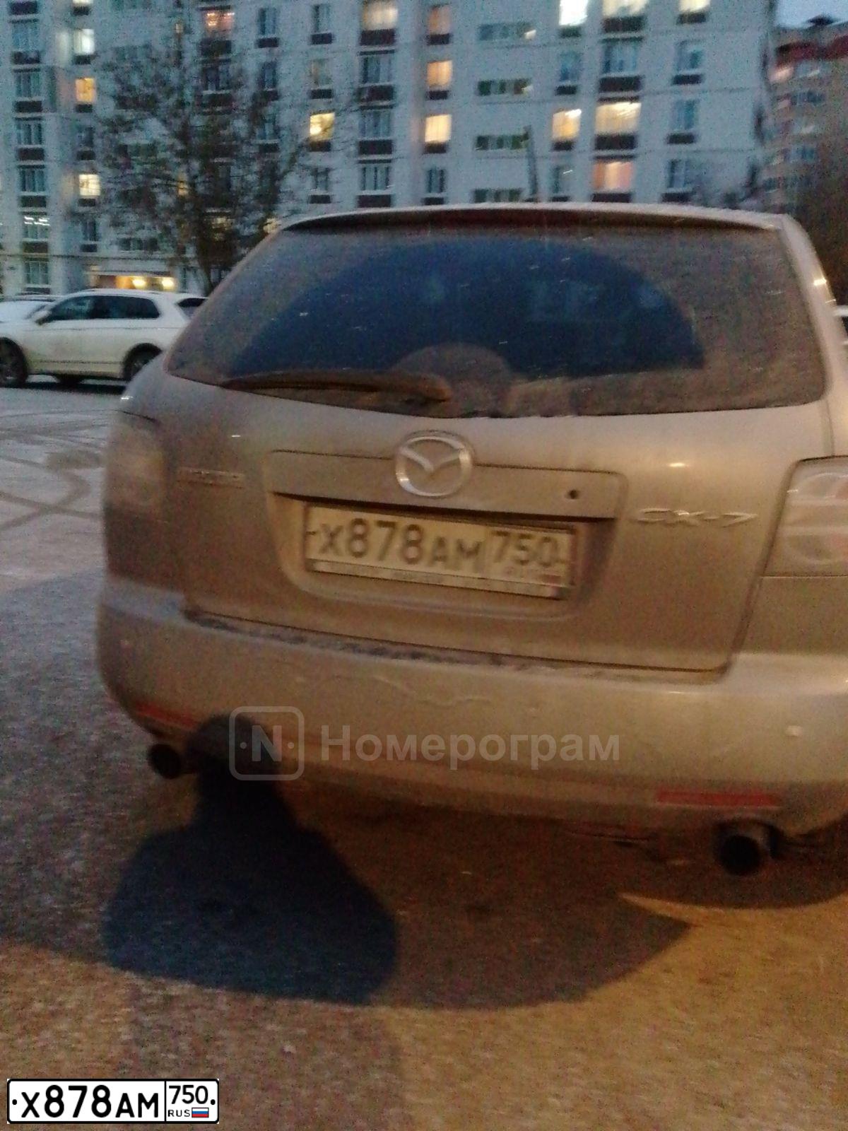 Фото автомобиля MERCEDES M-KLASSE, 2005 — госномер Е954АК777. Цвет: ЧЕРНЫЙ