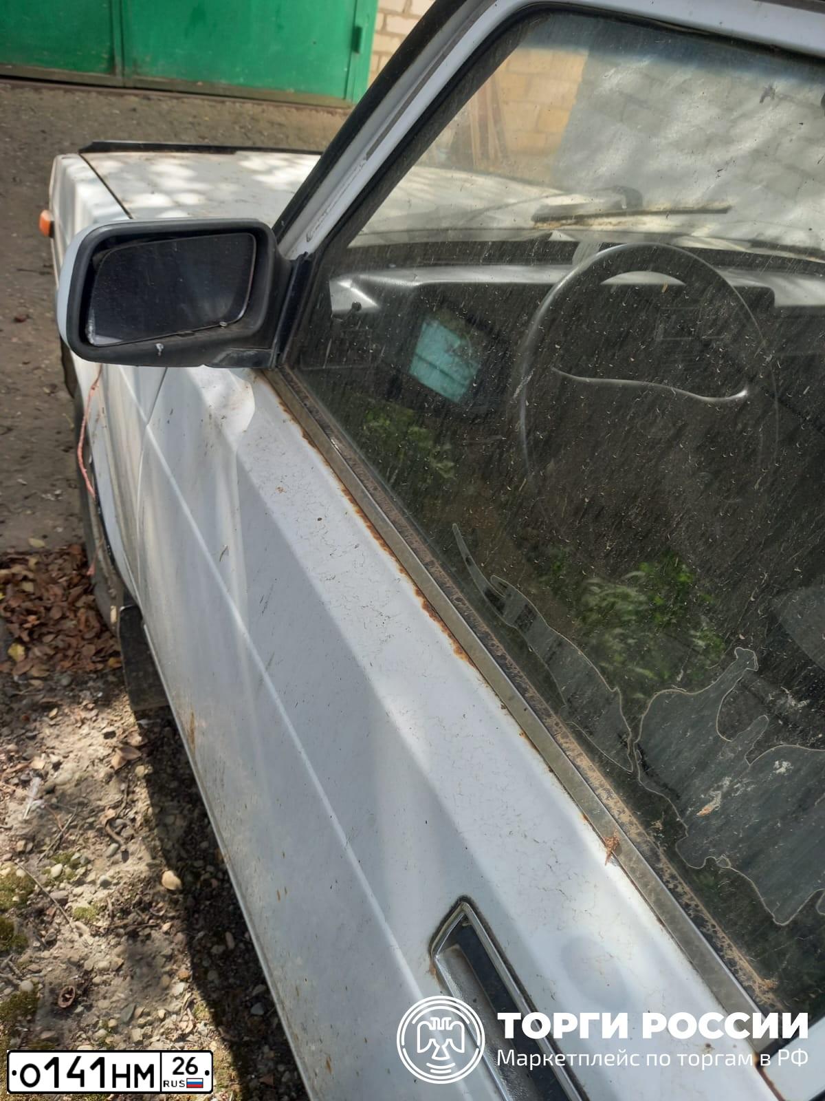 Фото автомобиля LADA 2107, 2005 — госномер О141НМ26. Цвет: ЯРКО-БЕЛЫЙ