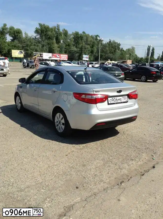 Фото автомобиля KIA RIO, 2012 — госномер Н783ОХ123. Цвет: СЕРЫЙ