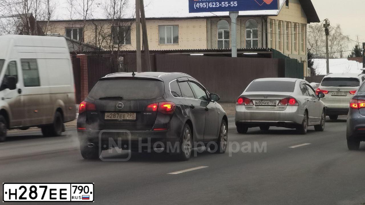 Фото автомобиля OPEL ASTRA, 2012 — госномер Н287ЕЕ790. Цвет: ЧЕРНЫЙ