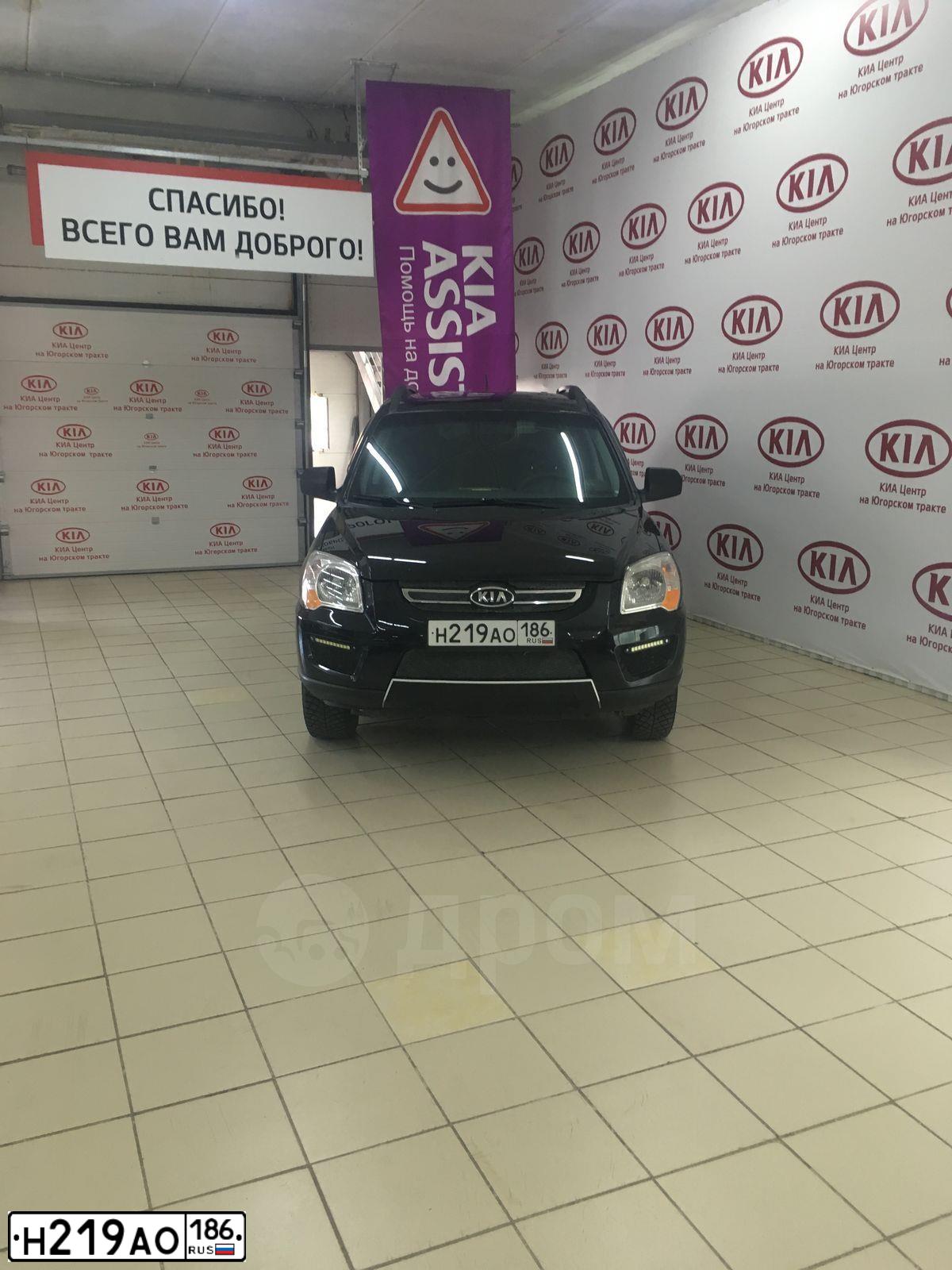 Фото автомобиля KIA SPORTAGE, 2009 — госномер Е290ХС86. Цвет: ЧЕРНЫЙ ПЕРЛАМУТР