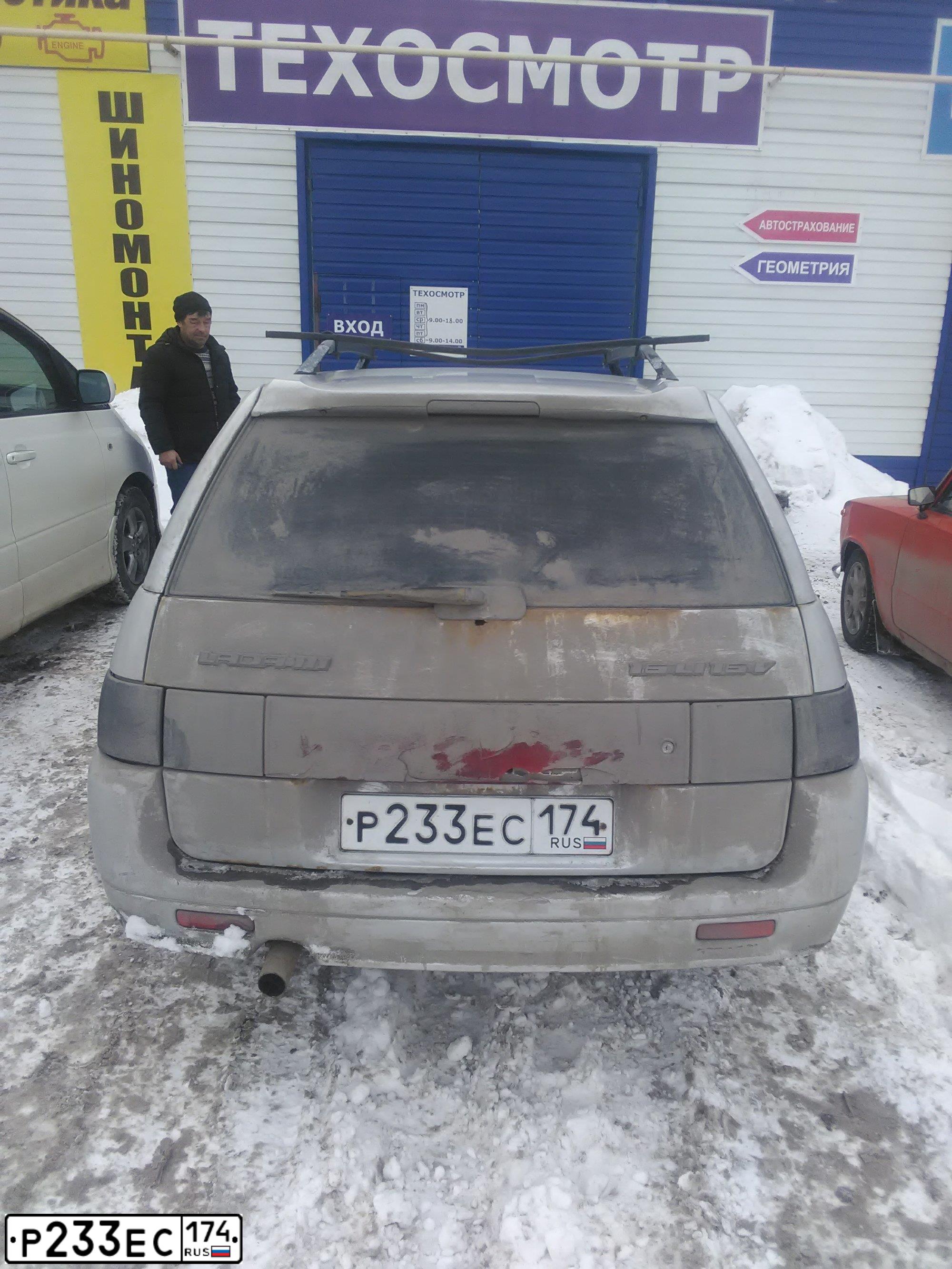 Фото автомобиля LADA 2111, 2005 — госномер Р233ЕС174. Цвет: СВЕТЛО СЕРЕБР МЕТАЛЛ