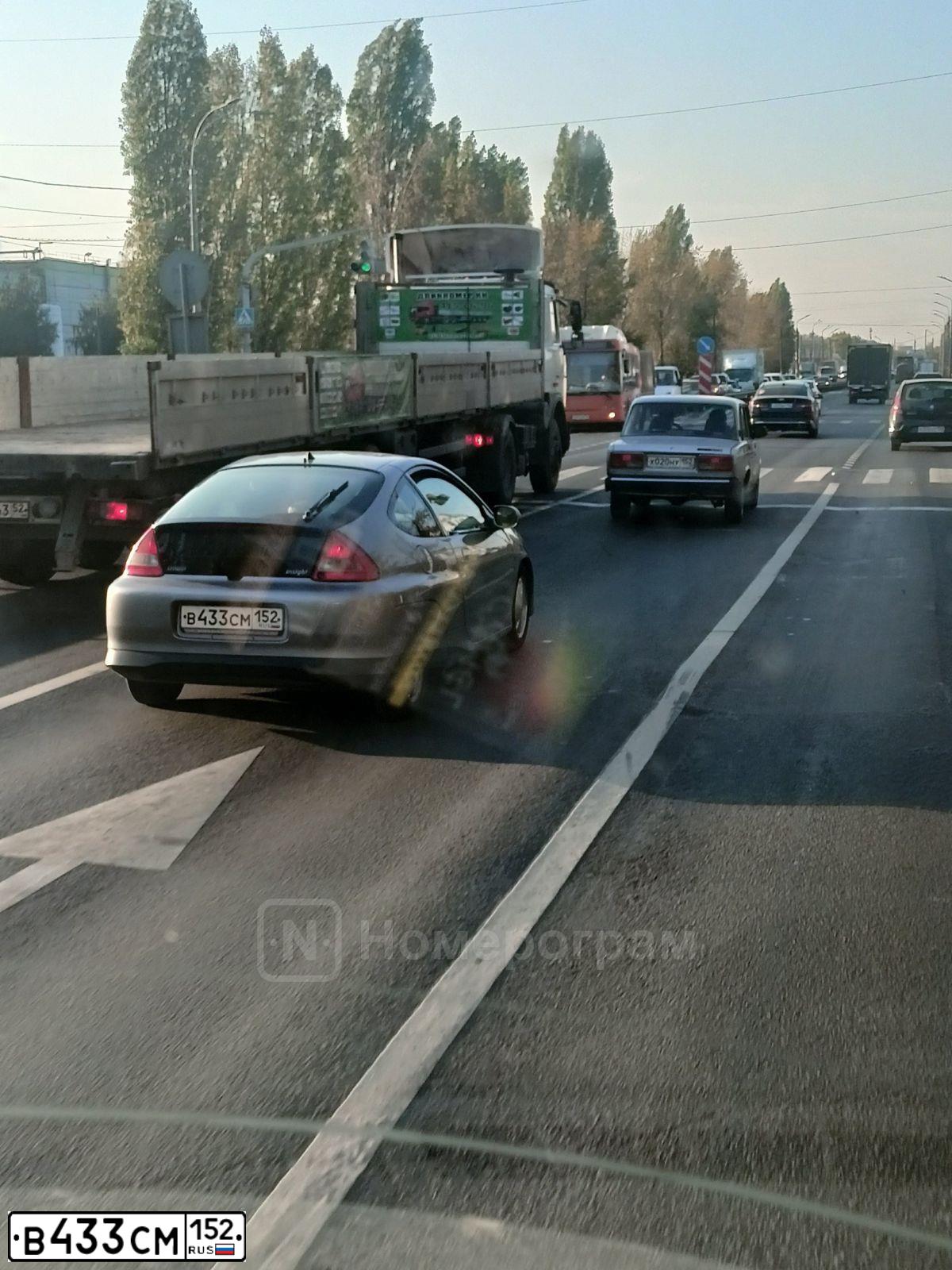 Фото автомобиля HONDA INSIGHT, 2000 — госномер В433СМ152. Цвет: СЕРЫЙ