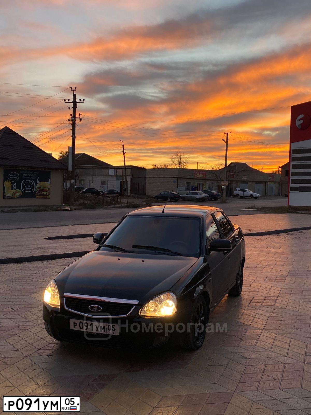 Фото автомобиля LADA 2170 PRIORA, 2015 — госномер Е905МК30. Цвет: ЧЕРНЫЙ