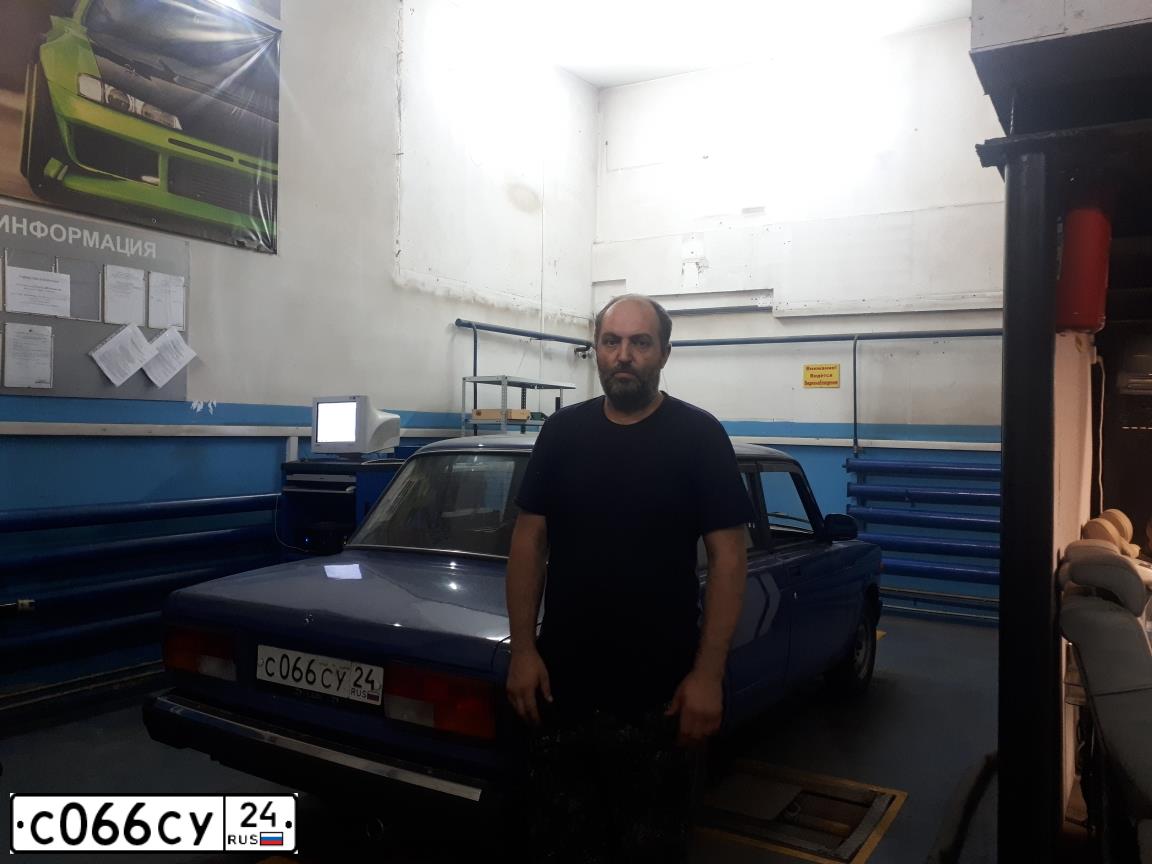 Фото автомобиля LADA 2107, 2006 — госномер С066СУ24. Цвет: синий