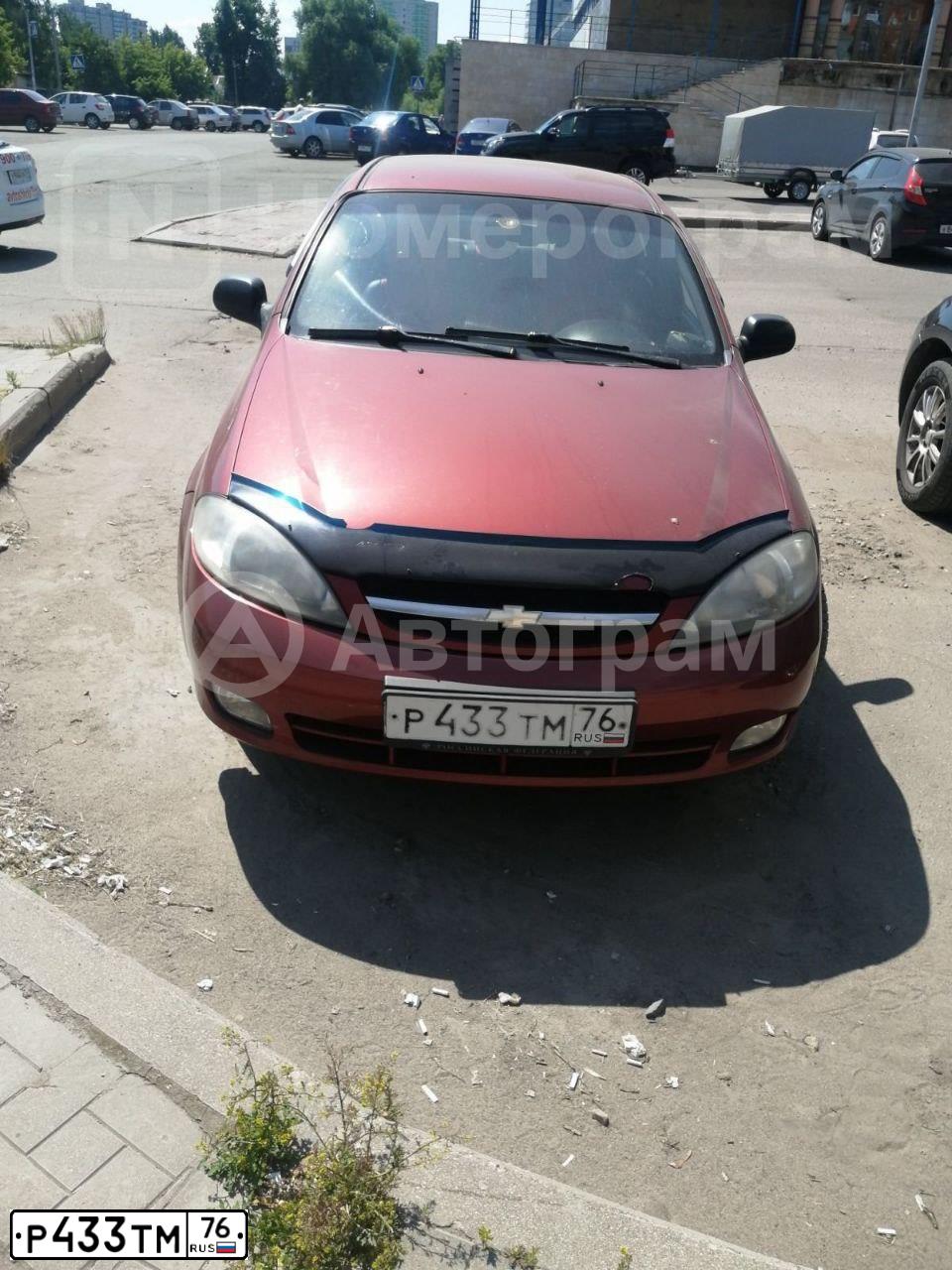 Фото автомобиля CHEVROLET LACETTI, 2007 — госномер Р433ТМ76. Цвет: КРАСНЫЙ
