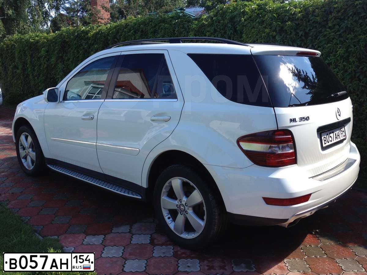 Фото автомобиля MERCEDES M-KLASSE, 2009 — госномер Р949МХ154. Цвет: Белый