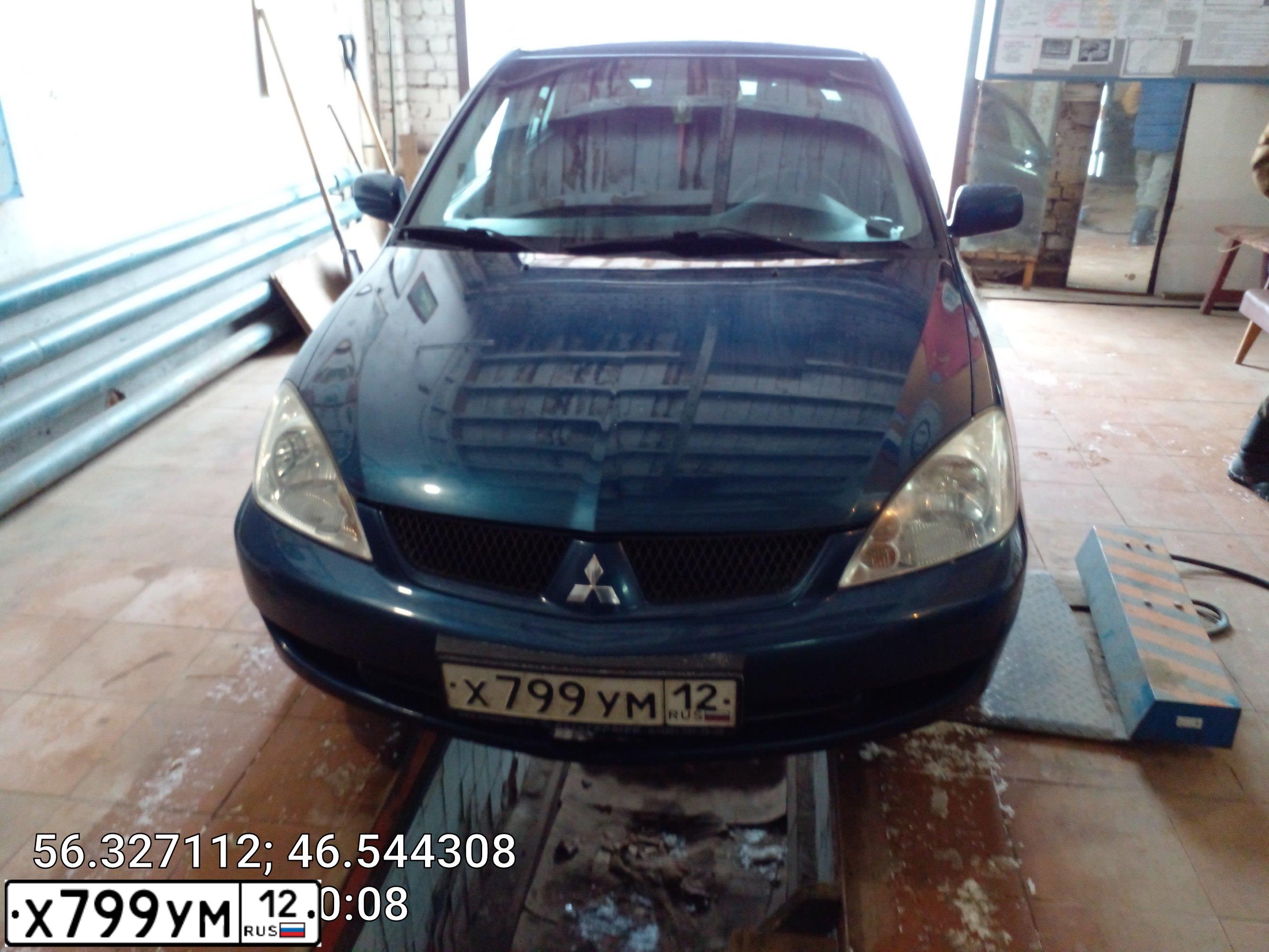 Фото автомобиля MITSUBISHI LANCER, 2005 — госномер Х799УМ12. Цвет: синий