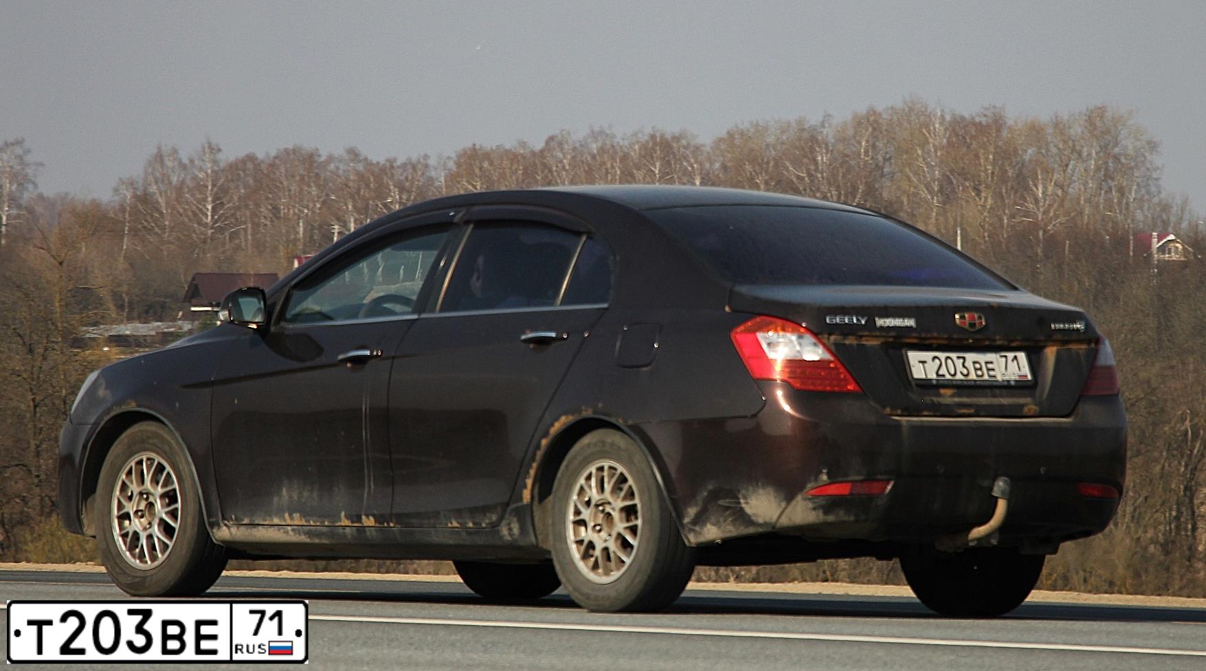 Фото автомобиля GEELY EMGRAND 7, 2014 — госномер Т203ВЕ71. Цвет: ТЕМНО-КРАСНЫЙ