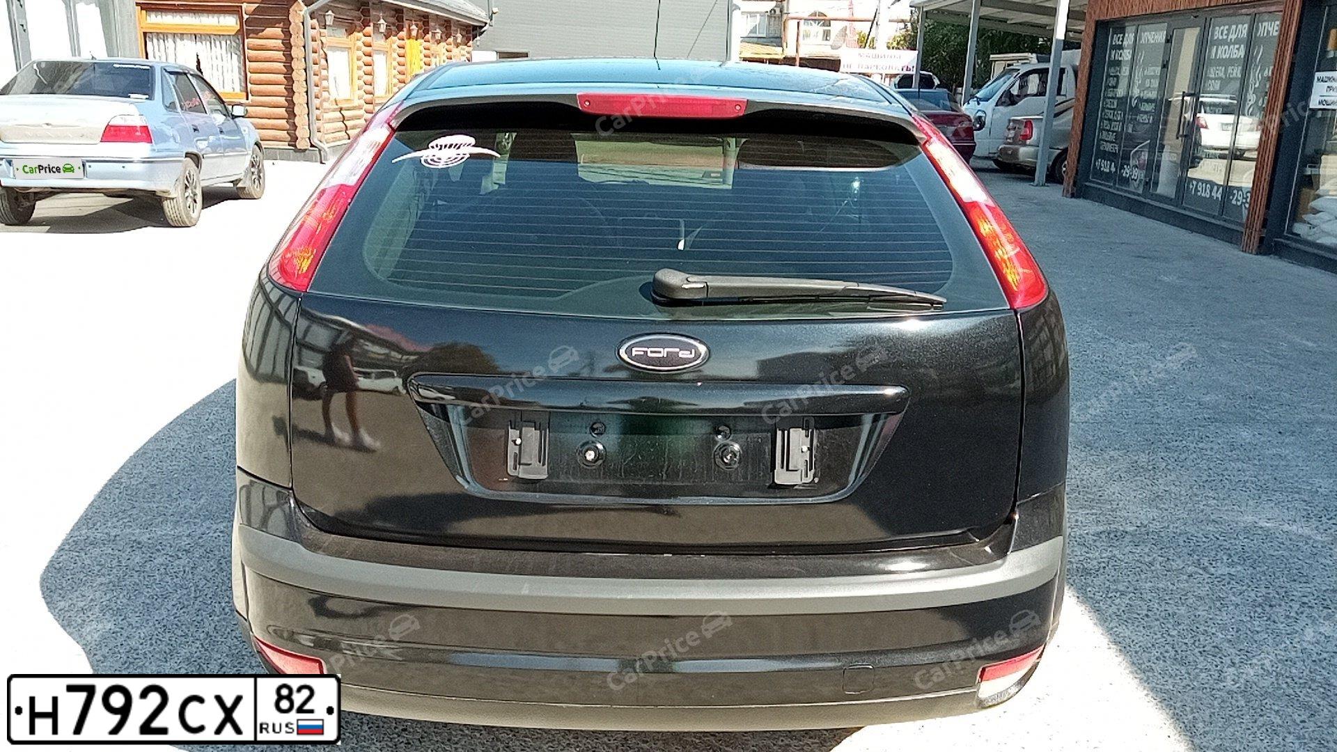 Фото автомобиля FORD FOCUS, 2007 — госномер Н419УЕ82. Цвет: ЧЕРНЫЙ
