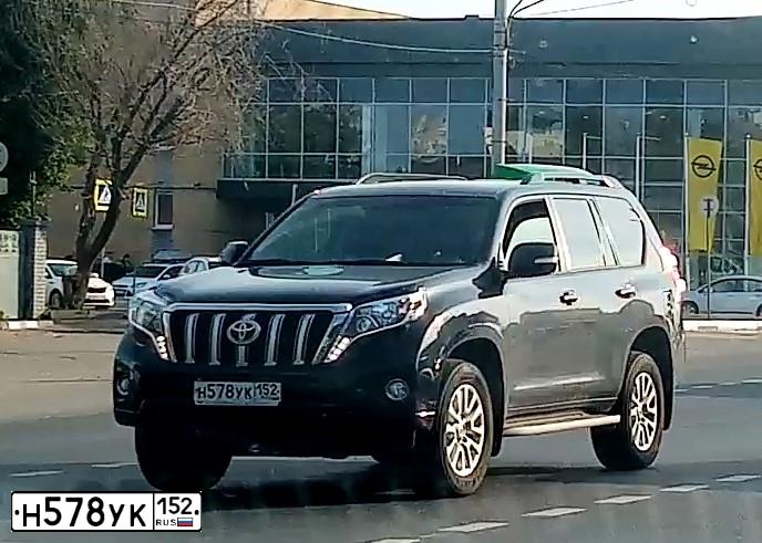 Фото автомобиля TOYOTA LAND CRUISER PRADO, 2015 — госномер А552ХК252. Цвет: ЧЕРНЫЙ