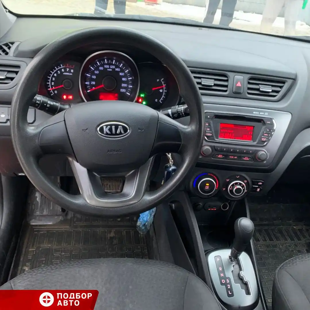 Фото автомобиля KIA RIO, 2012 — госномер А715АР57. Цвет: КРАСНЫЙ