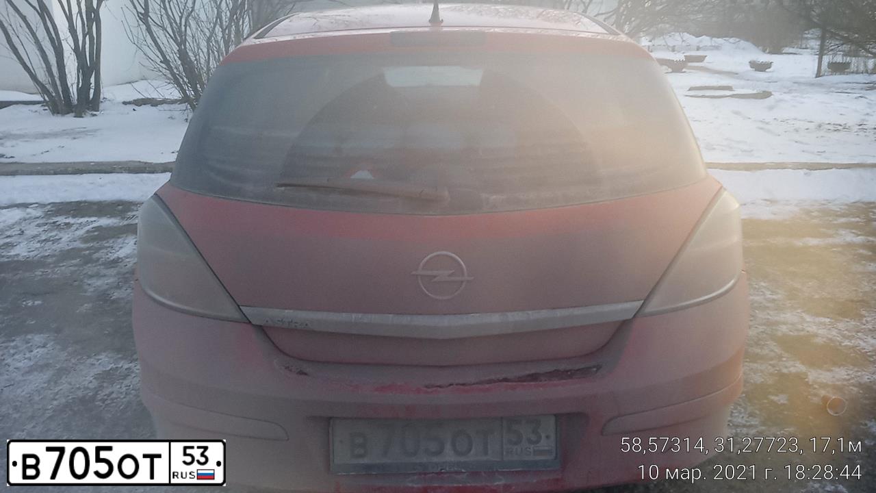 Фото автомобиля OPEL ASTRA, 2008 — госномер В705ОТ53. Цвет: КРАСНЫЙ