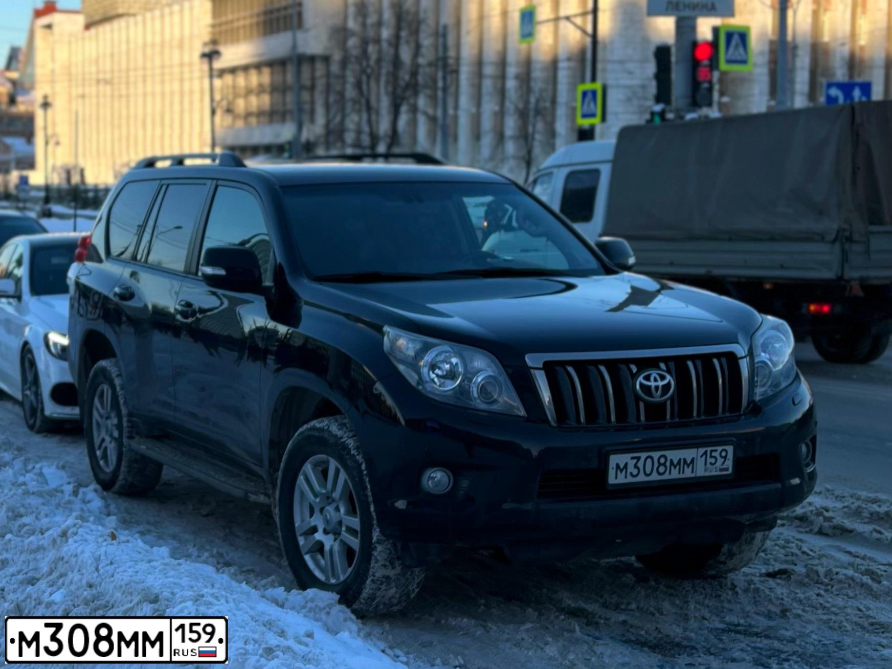Фото автомобиля SUBARU OUTBACK, 2010 — госномер Н464ОУ159. Цвет: ЧЕРНЫЙ