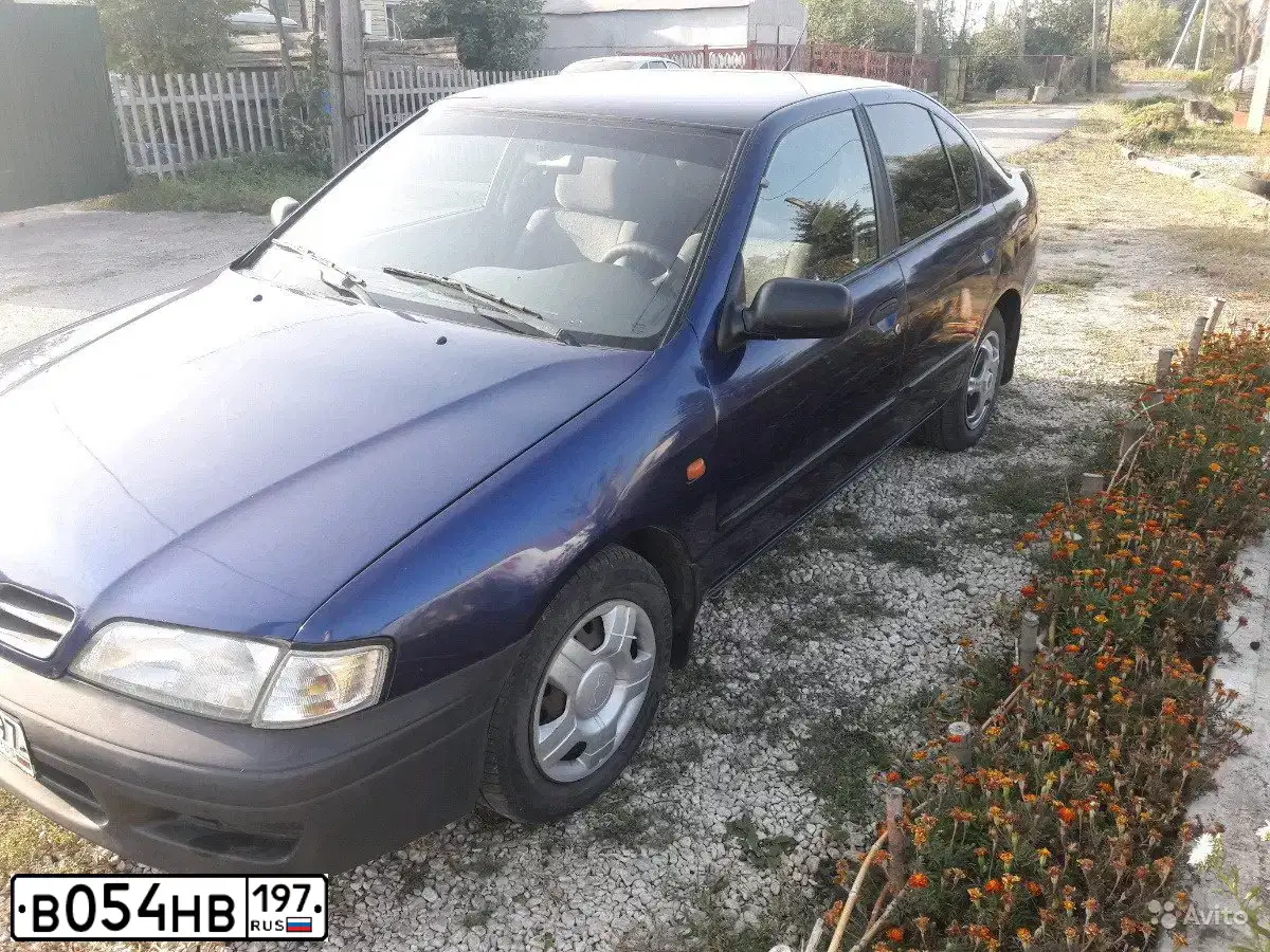 Фото автомобиля NISSAN PRIMERA, 1997 — госномер Р703ВО48. Цвет: синий