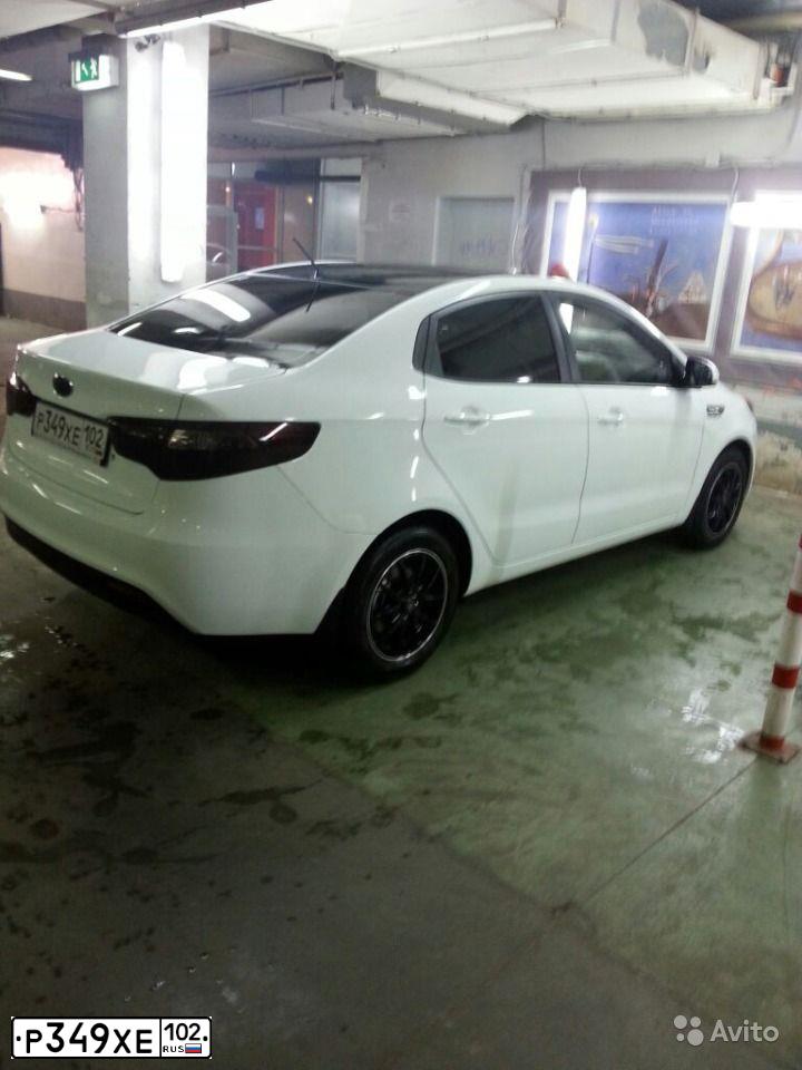 Фото автомобиля KIA RIO, 2014 — госномер Р349ХЕ102. Цвет: БЕЛЫЙ