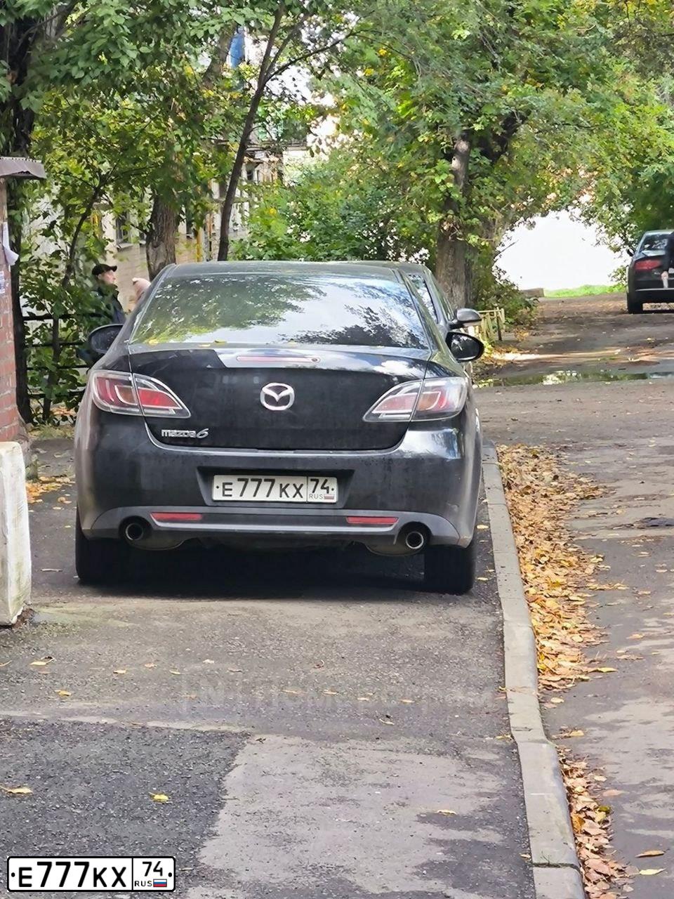 Фото автомобиля MAZDA 6, 2011 — госномер Е777КХ74. Цвет: ЧЕРНЫЙ