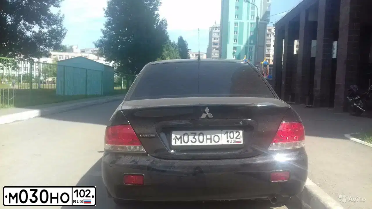 Фото автомобиля MITSUBISHI LANCER, 2004 — госномер М030НО102. Цвет: ЧЕРНЫЙ