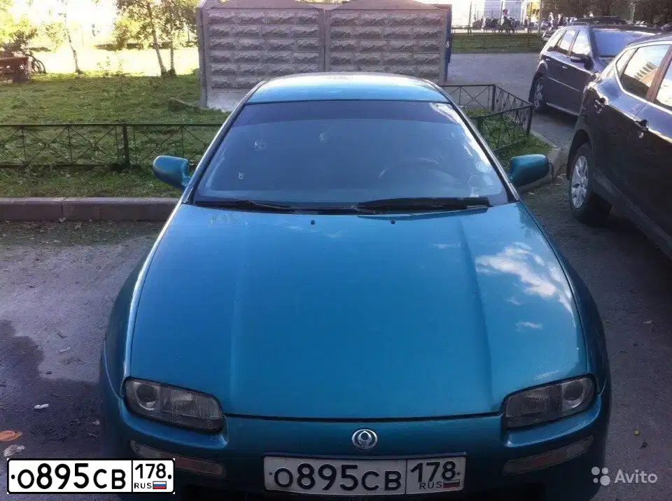 Фото автомобиля MAZDA 323, 1996 — госномер О895СС178. Цвет: ЗЕЛЕНЫЙ