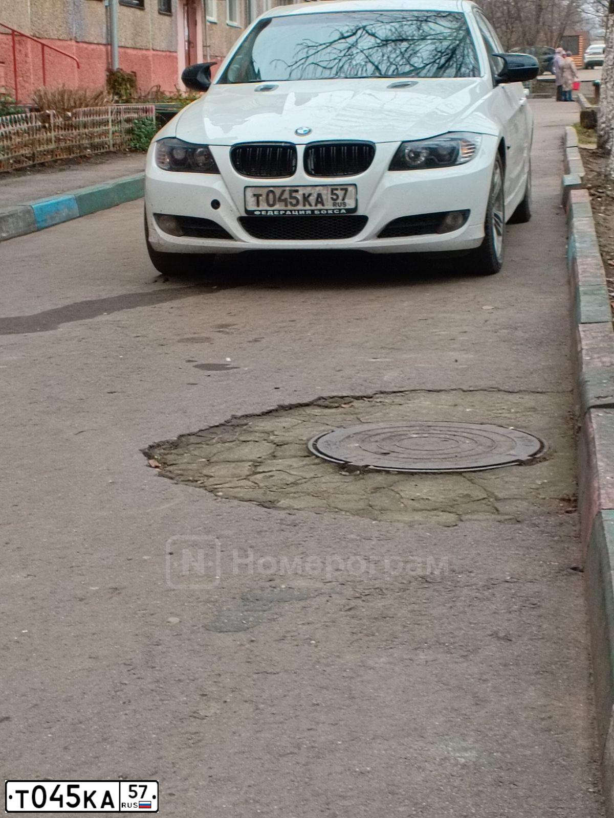 Фото автомобиля LADA 2172 PRIORA, 2008 — госномер Т045КА57. Цвет: ЧЕРНЫЙ