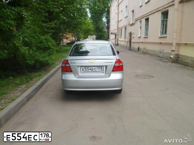 Фото автомобиля CHEVROLET AVEO, 2011 — госномер К922АХ53. Цвет: Серебристый