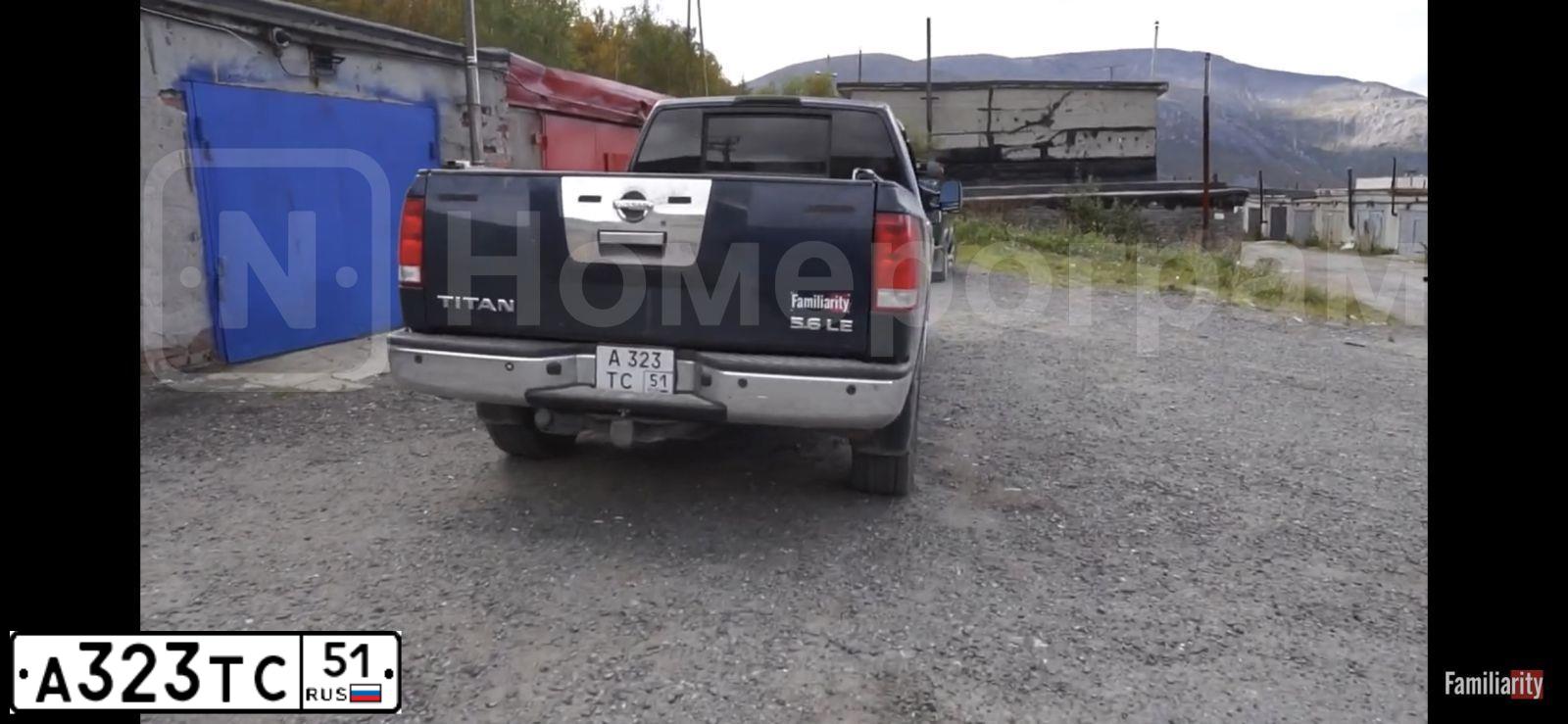 Фото автомобиля NISSAN TITAN, 2007 — госномер А323ТС51. Цвет: СИНИЙ ТЕМНЫЙ