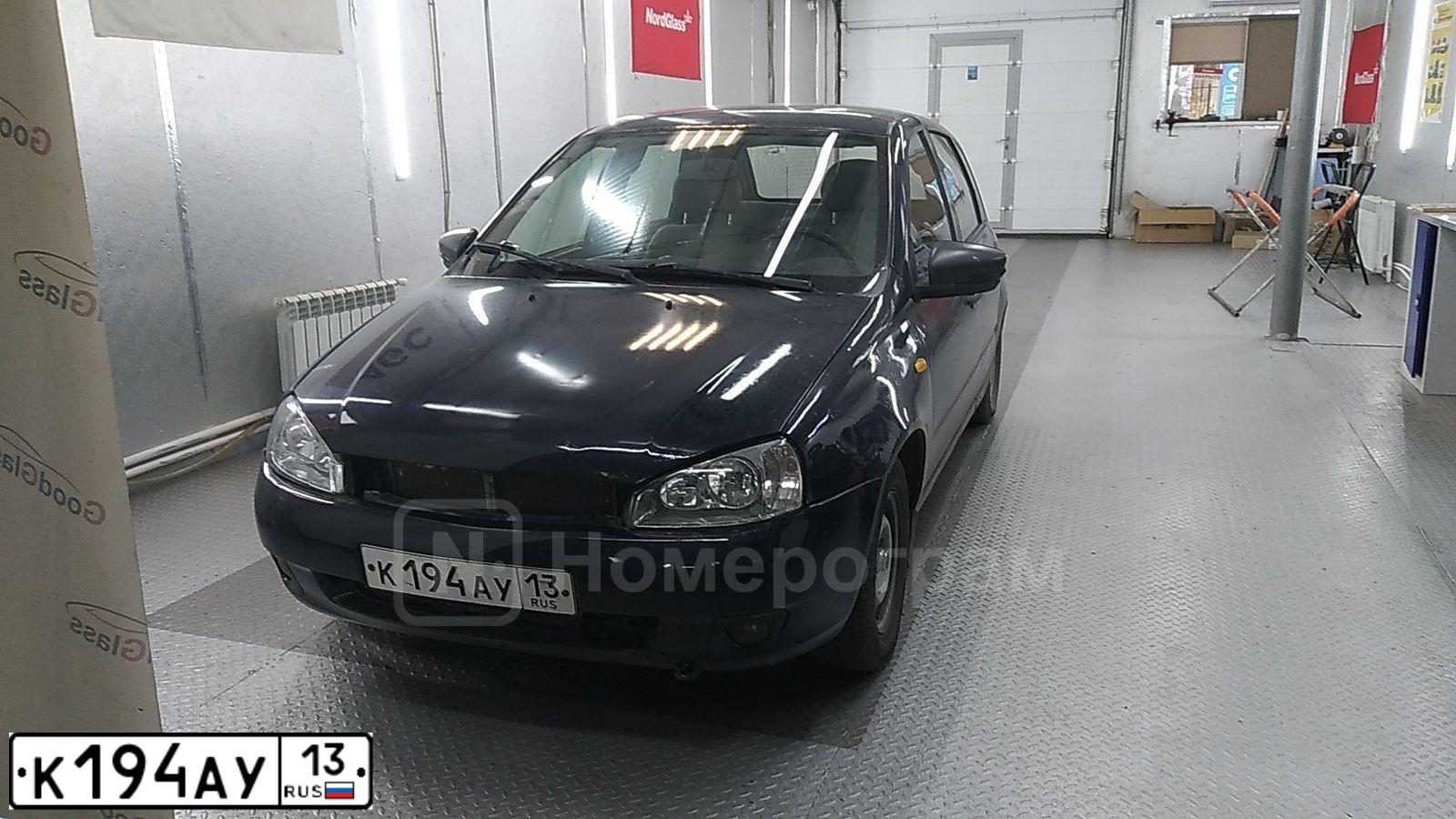 Фото автомобиля LADA 1119 KALINA, 2008 — госномер К194АУ13. Цвет: Темный Сине-Фиолетовый