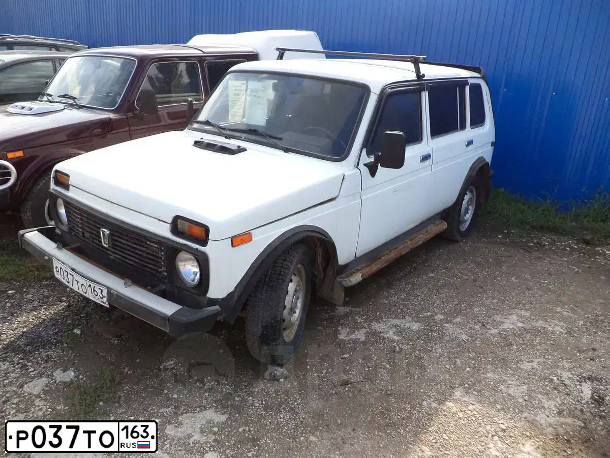 Фото автомобиля LADA 2131 NIVA, 1999 — госномер О740ЕЕ136. Цвет: ЯРКО-БЕЛЫЙ
