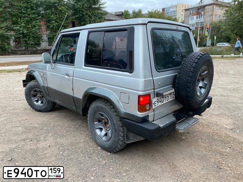 Фото автомобиля HYUNDAI GALLOPER, 1995 — госномер Е940ТО159. Цвет: СЕРЫЙ
