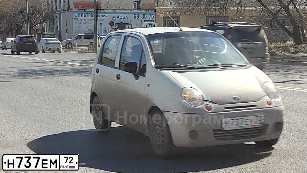 Фото автомобиля TOYOTA COROLLA, 2007 — госномер Н737ЕМ72. Цвет: ТЕМНО СИНИЙ