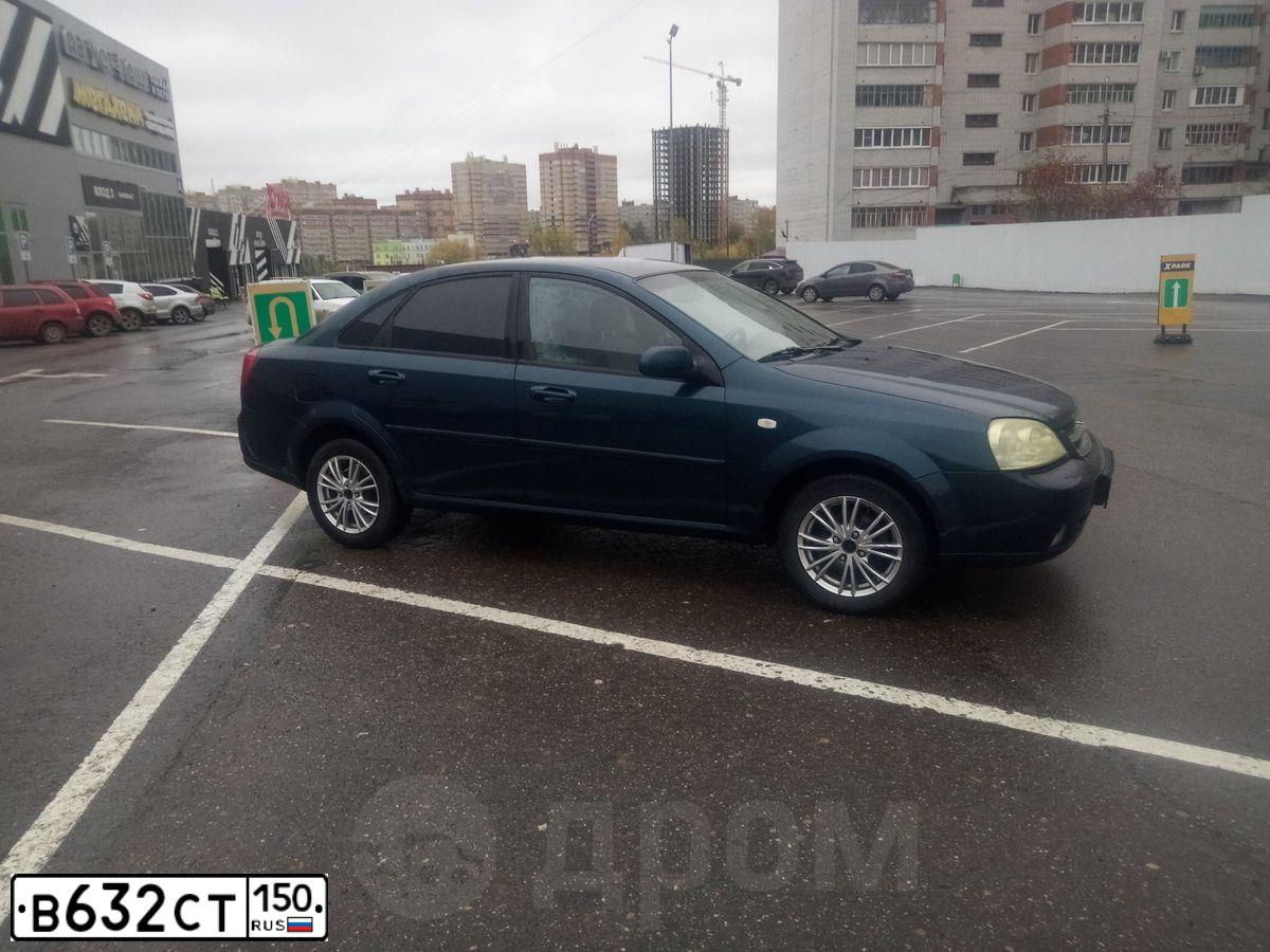 Фото автомобиля OPEL INSIGNIA, 2012 — госномер Е994АК50. Цвет: СЕРЫЙ