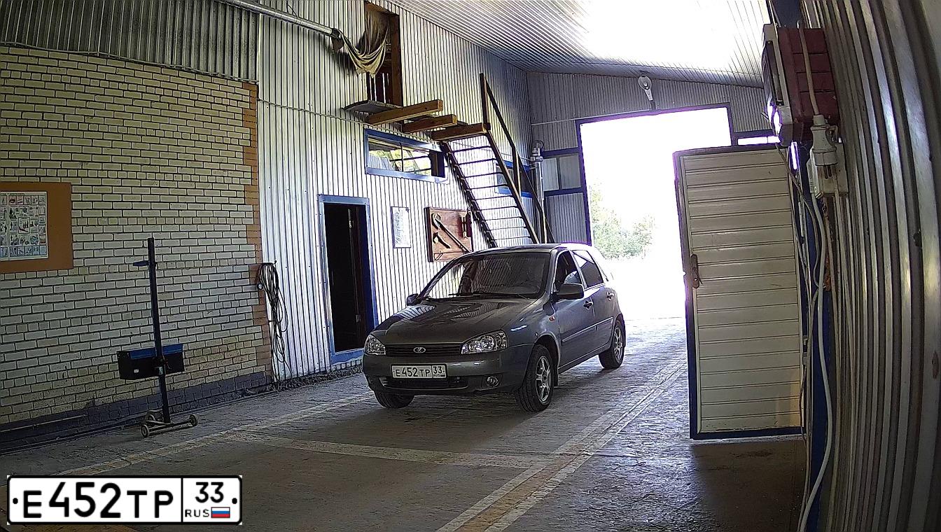 Фото автомобиля LADA KALINA, 2010 — госномер Х497УК33. Цвет: Темно-серый металлик
