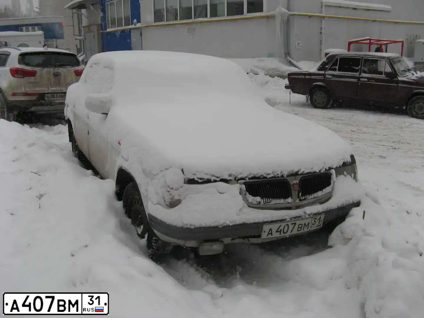 Фото автомобиля GAZ 3110 WOLGA, 1998 — госномер А407ВМ31. Цвет: Белый