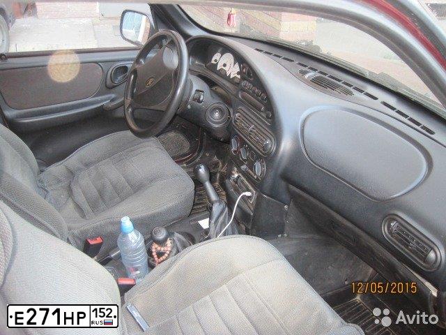 Фото автомобиля CHEVROLET NIVA, 2006 — госномер С807УУ52. Цвет: Красный