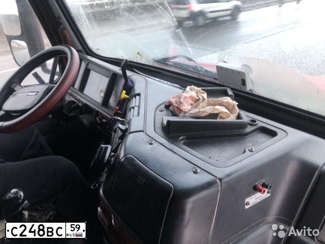 Фото автомобиля VOLVO SERIE VNL /6X4/, 1999 — госномер Т201ХН05. Цвет: МАЛИНОВЫЙ