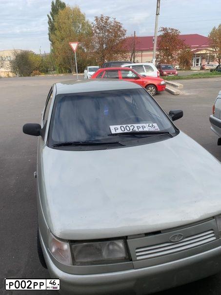 Фото автомобиля LADA 2112, 2005 — госномер Р002РР46. Цвет: МОЛОЧНО - БЕЛЫЙ