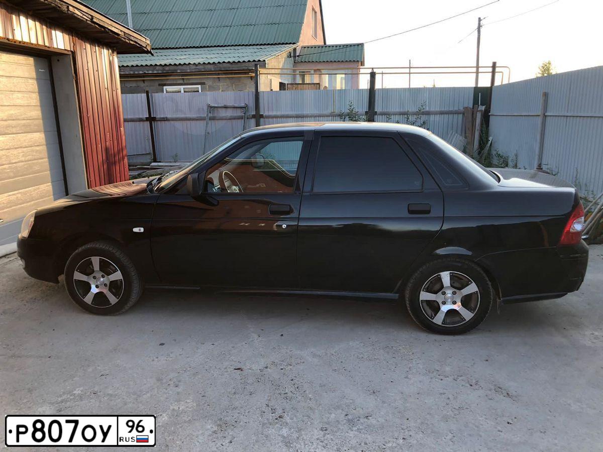 Фото автомобиля LADA 2170 PRIORA, 2010 — госномер Е241ВН774. Цвет: ЧЕРНЫЙ