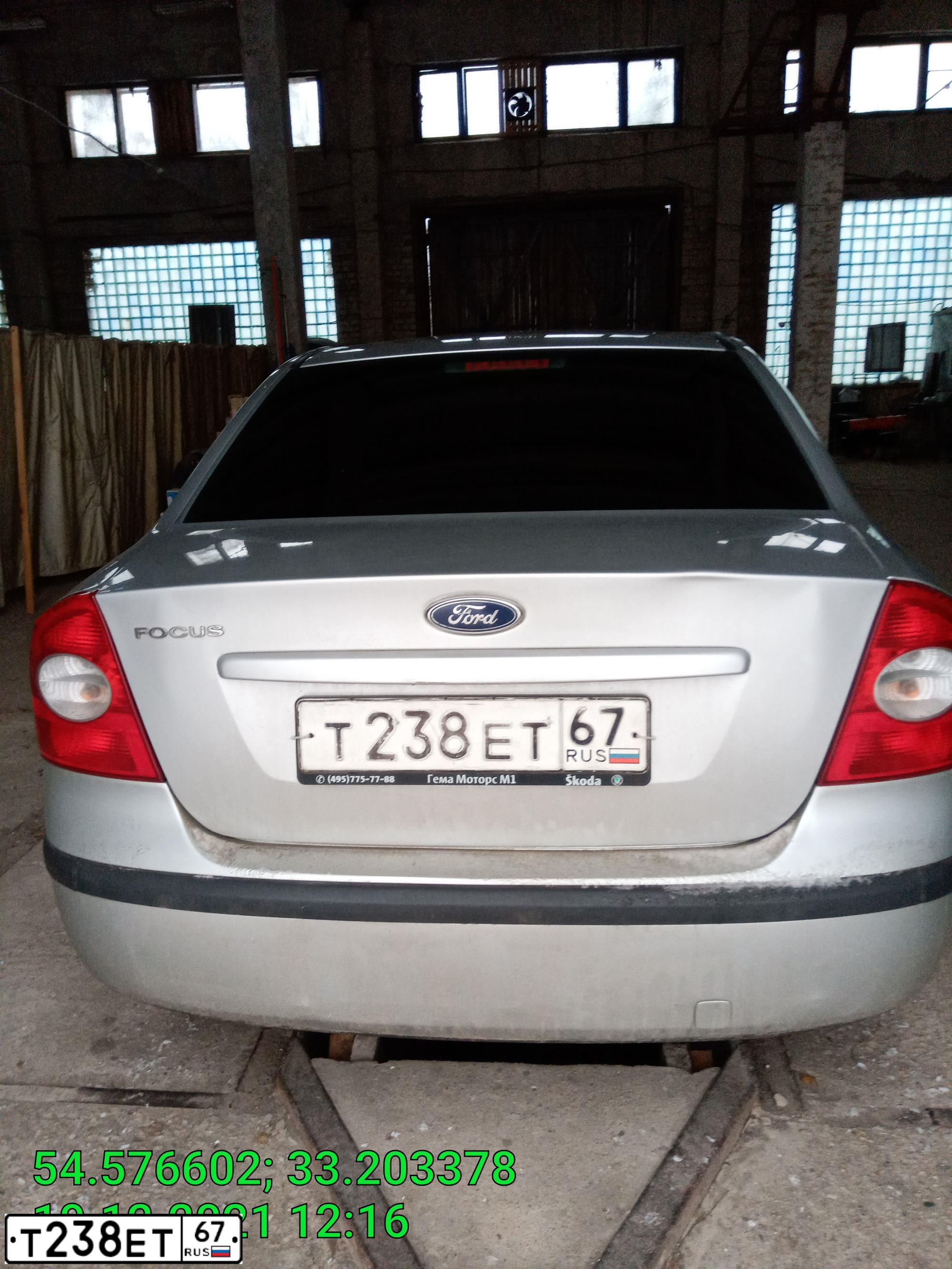 Фото автомобиля FORD FOCUS, 2007 — госномер Т238ЕТ67. Цвет: СЕРЕБРИСТЫЙ